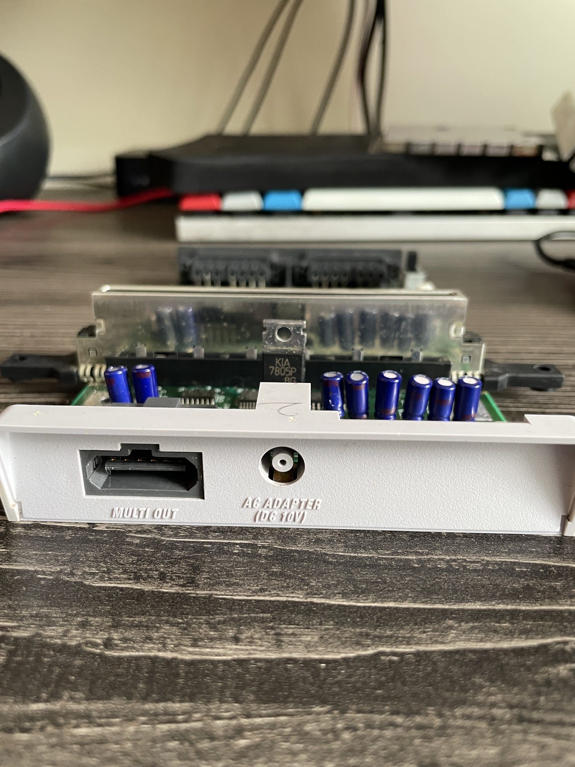 The SNES Jr. IO without the shell, but with the backplate.
